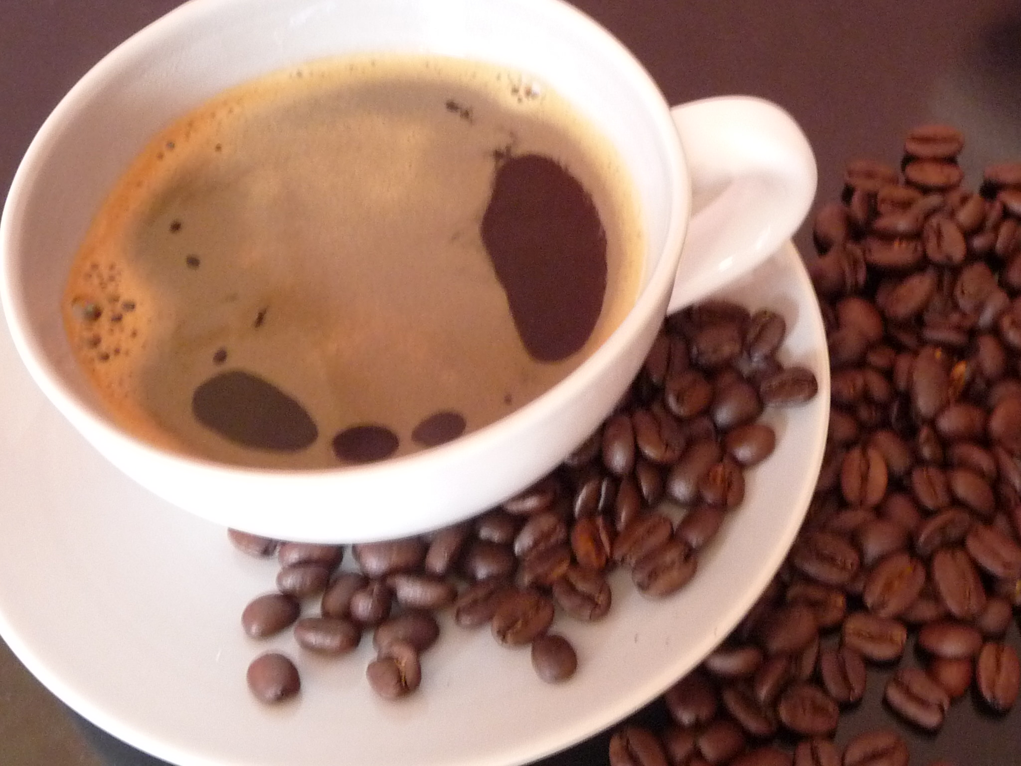 Coffee cup and beans